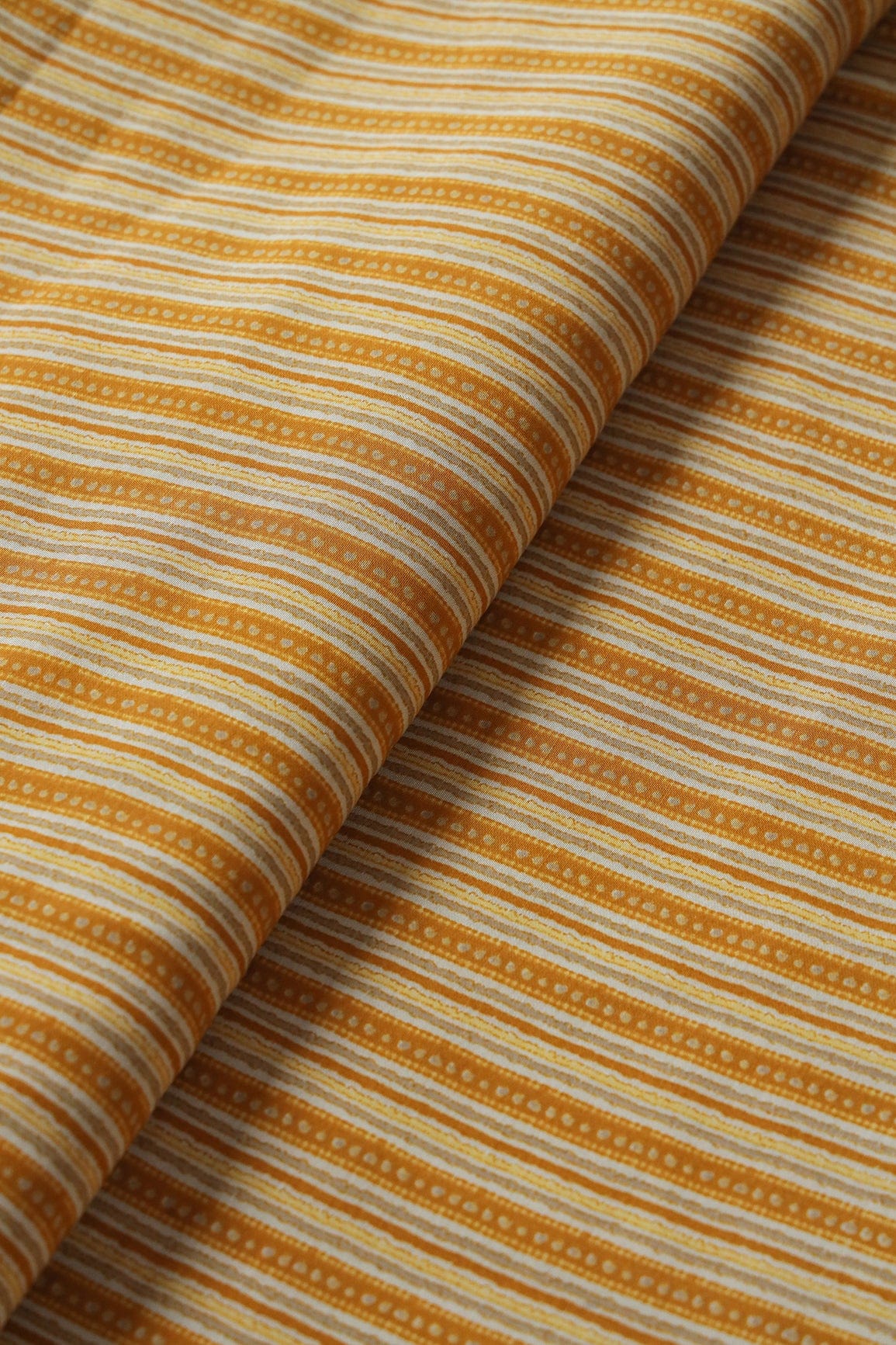 Mustard Yellow And Cream Stripes Print On Viscose Chanderi Silk Fabric - doeraa