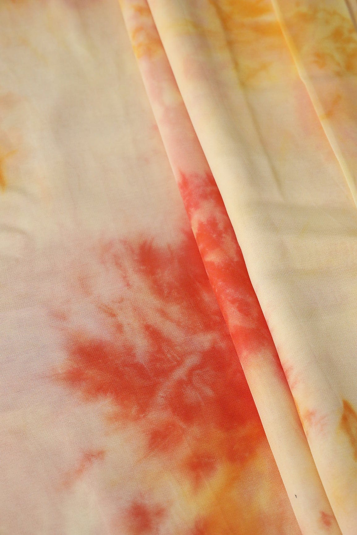 Orange And Pastel Yelllow Tie & Dye Shibori Print On Viscose Georgette Fabric - doeraa