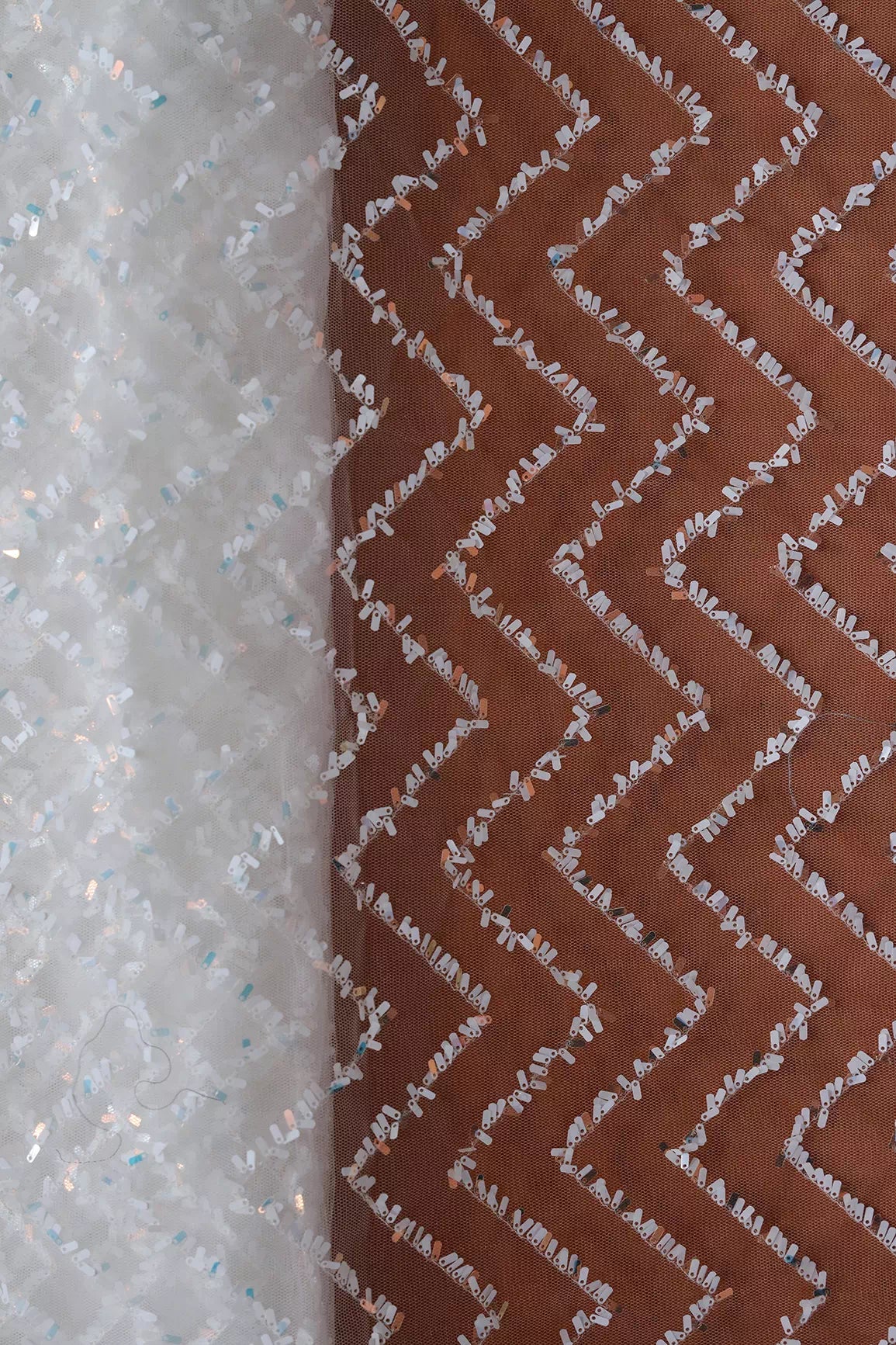 Oval Sequins Chevron Embroidery Work On White Dyeable Soft Net Fabric - doeraa