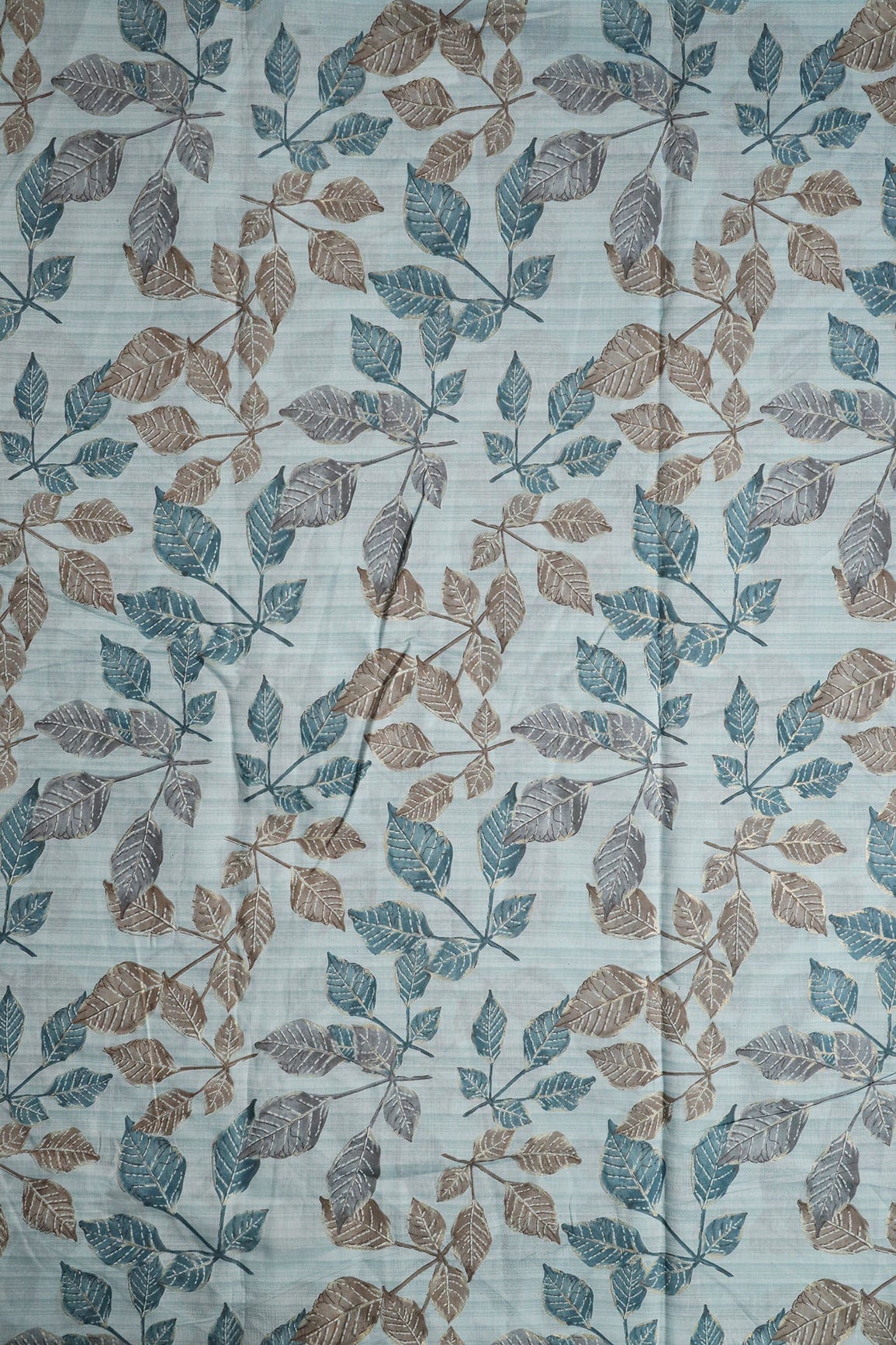 Pastel Blue And Brown Leafy Foil Print On Viscose Chanderi Silk Fabric - doeraa