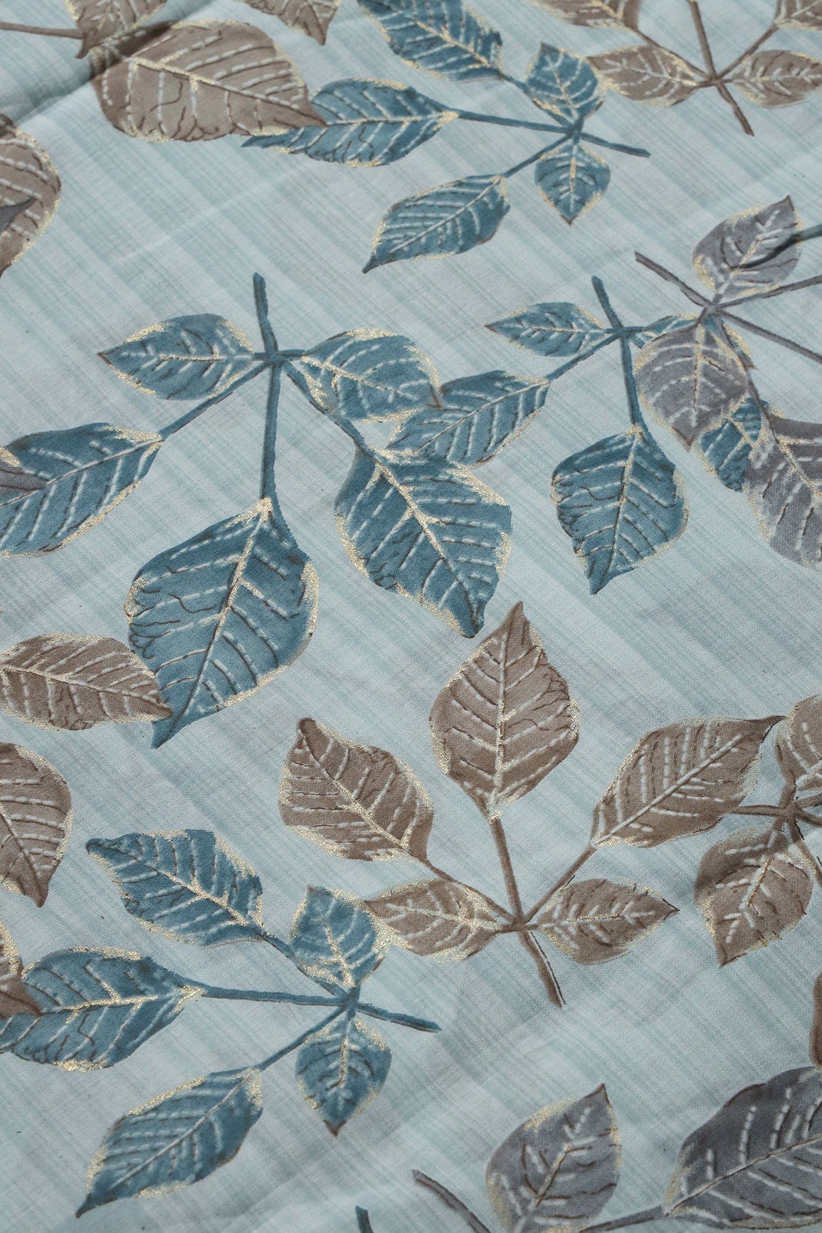 Pastel Blue And Brown Leafy Foil Print On Viscose Chanderi Silk Fabric - doeraa