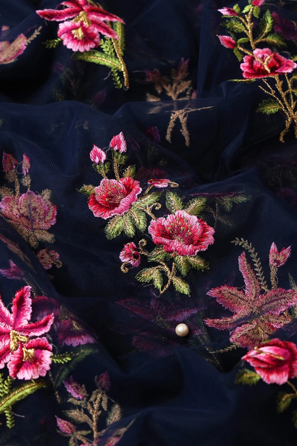 Pink And Olive Thread With Gold Zari Floral Embroidery On Navy Blue Soft Net Fabric - doeraa