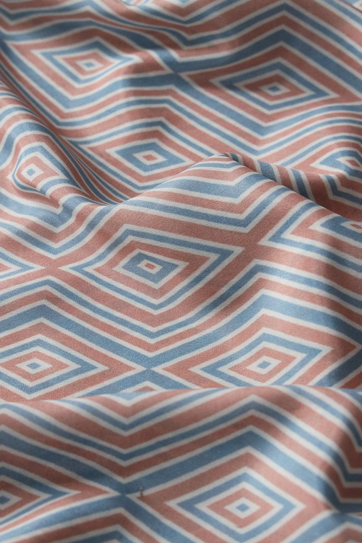 doeraa Prints Light Peach And Pastel Blue Geometric Pattern Digital Print On French Crepe Fabric