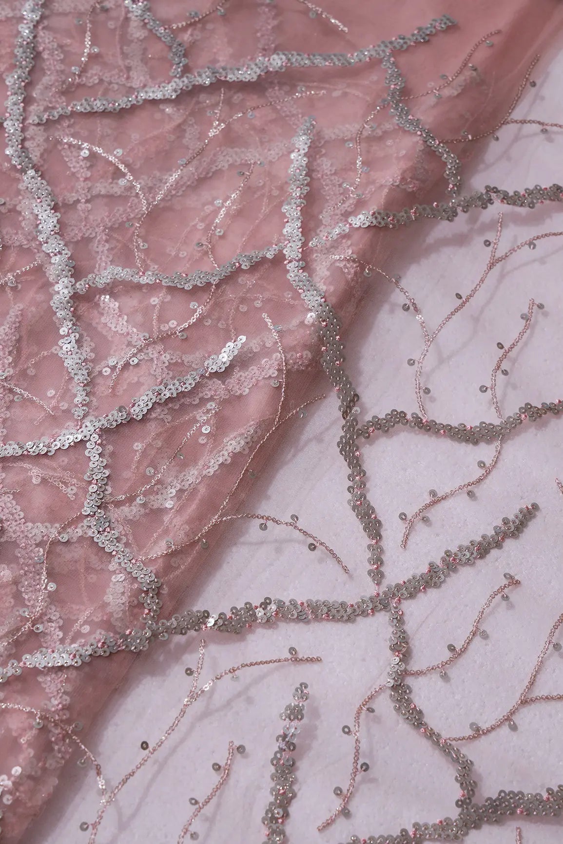 Silver Sequins Geometric Embroidery On Pink Soft Net Fabric - doeraa