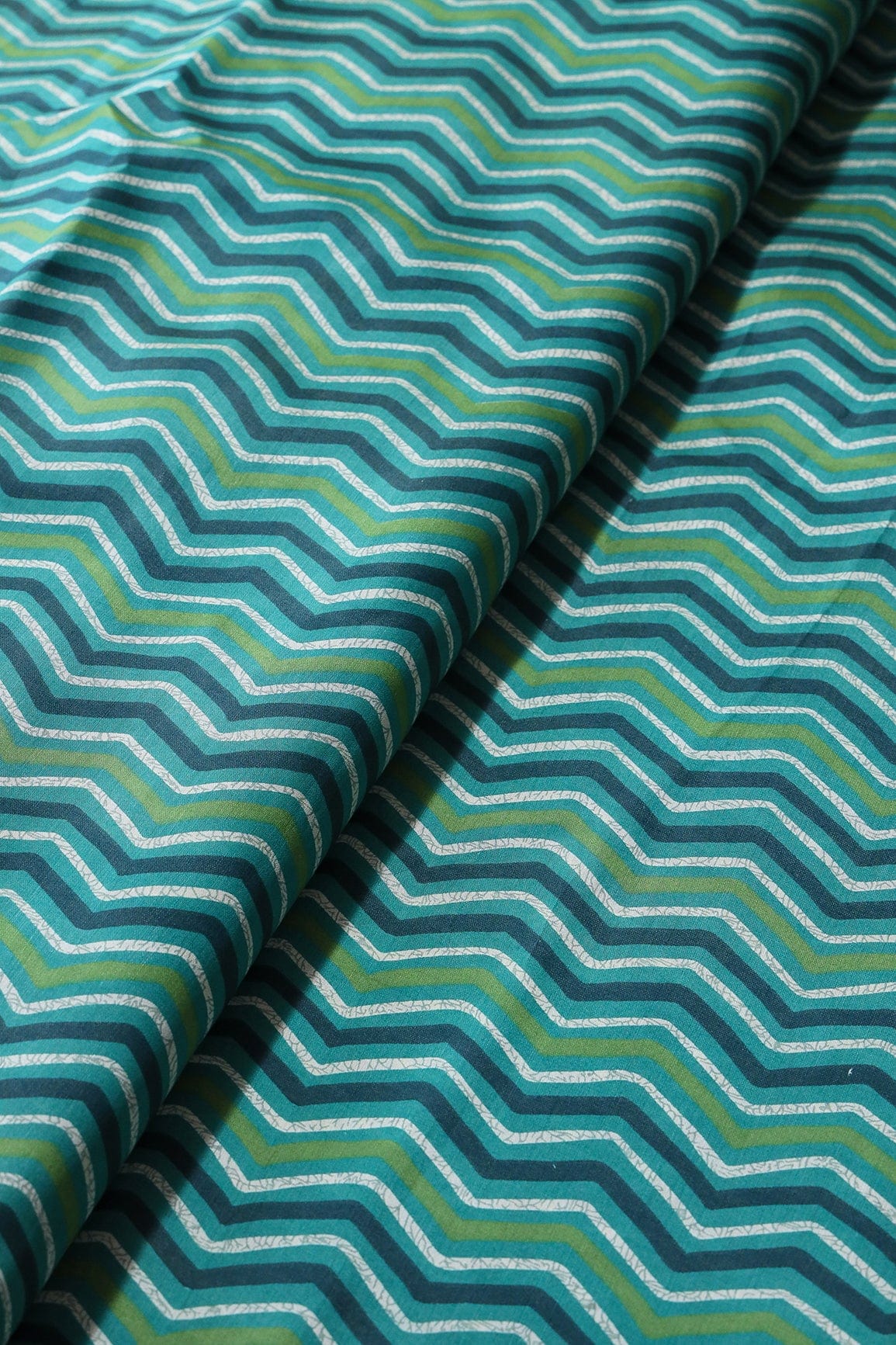 Teal And Cream Chevron Print On Viscose Chanderi Silk Fabric - doeraa