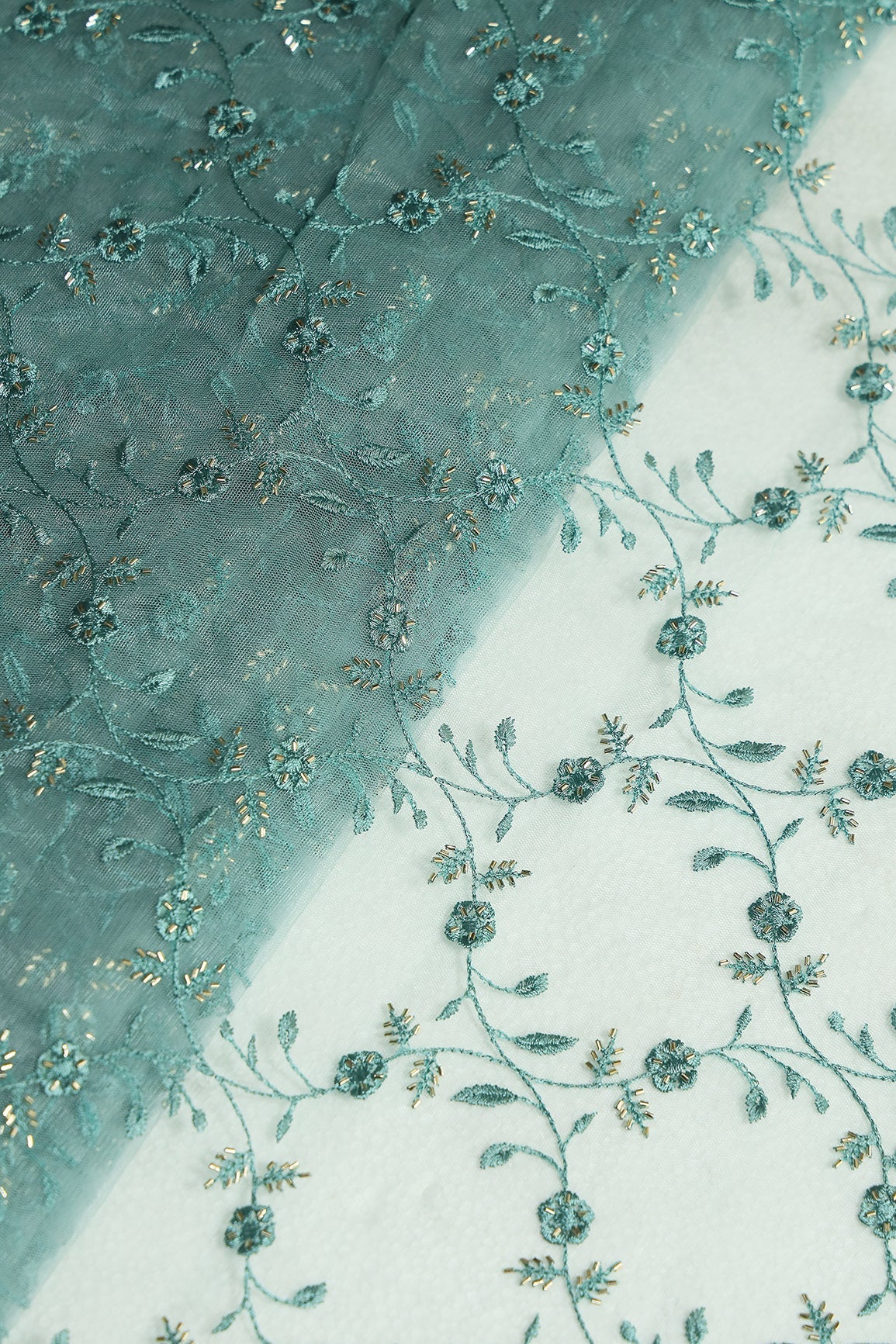 Teal Thread With Beads Floral Leafy Embroidery Work On Teal Soft Net Fabric - doeraa
