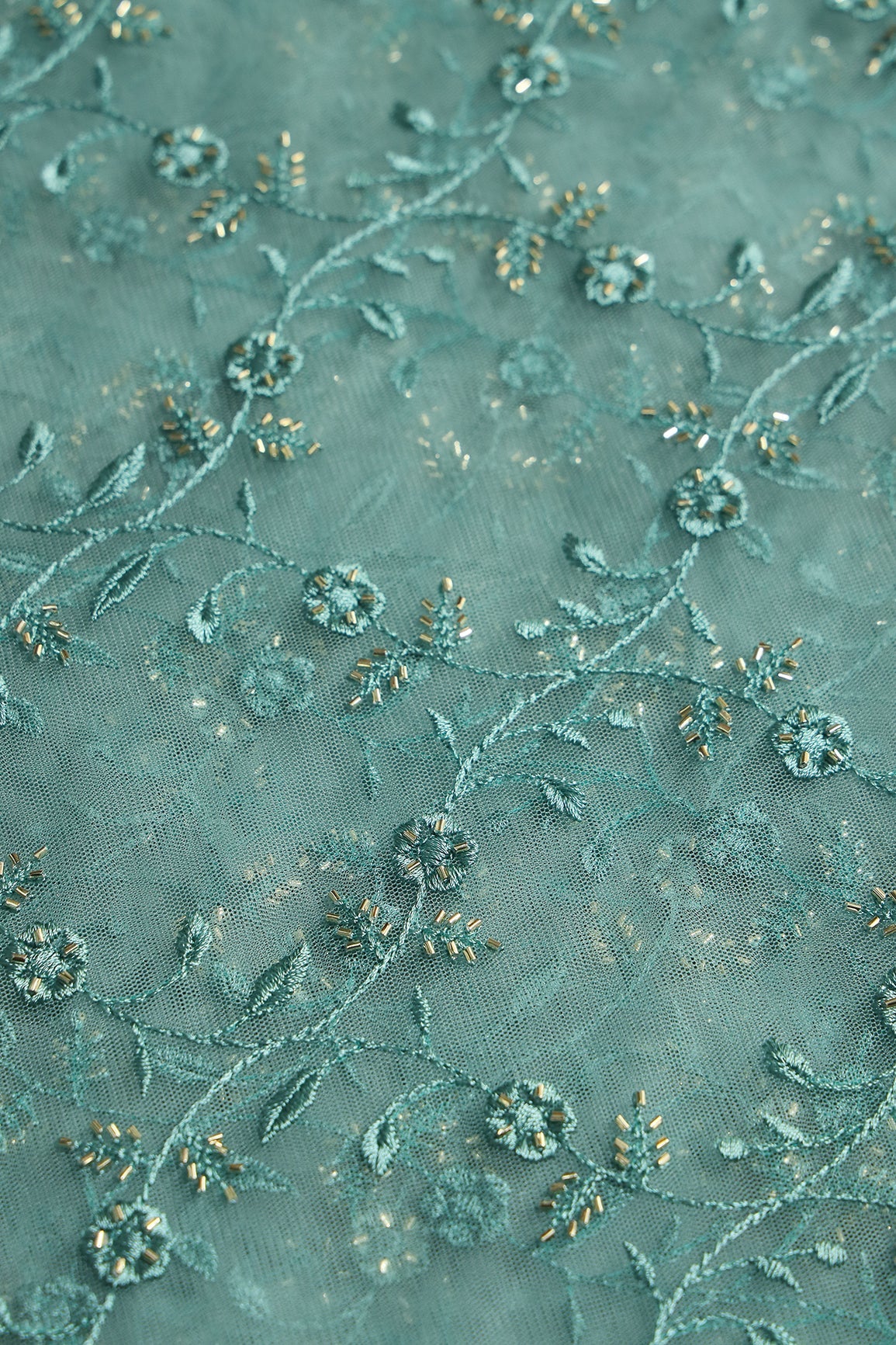 Teal Thread With Beads Floral Leafy Embroidery Work On Teal Soft Net Fabric - doeraa