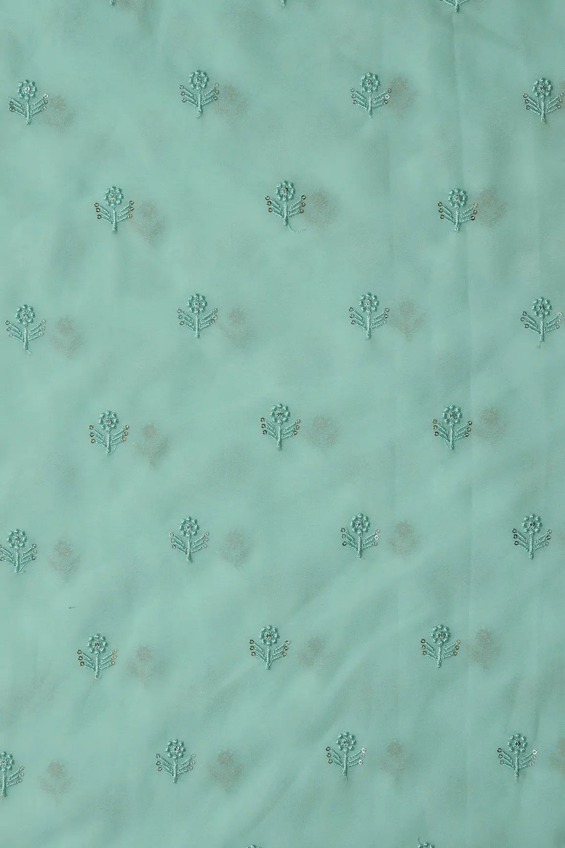 Turquoise Thread With Sequins Small Floral Embroidery Work On Pale Turquoise Georgette Fabric - doeraa