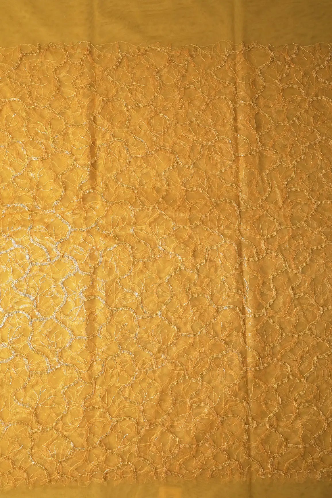 Water Sequins Abstract Embroidery On Yellow Soft Net Fabric - doeraa