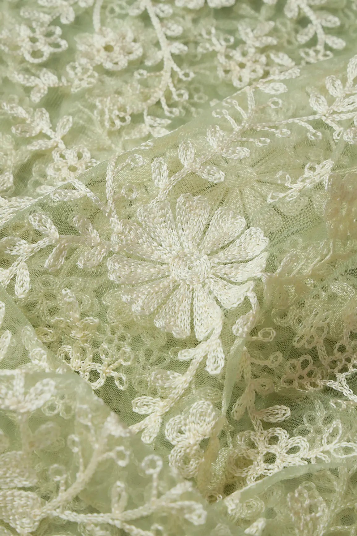 White Thread Heavy Floral Embroidery On Olive Soft Net Fabric - doeraa