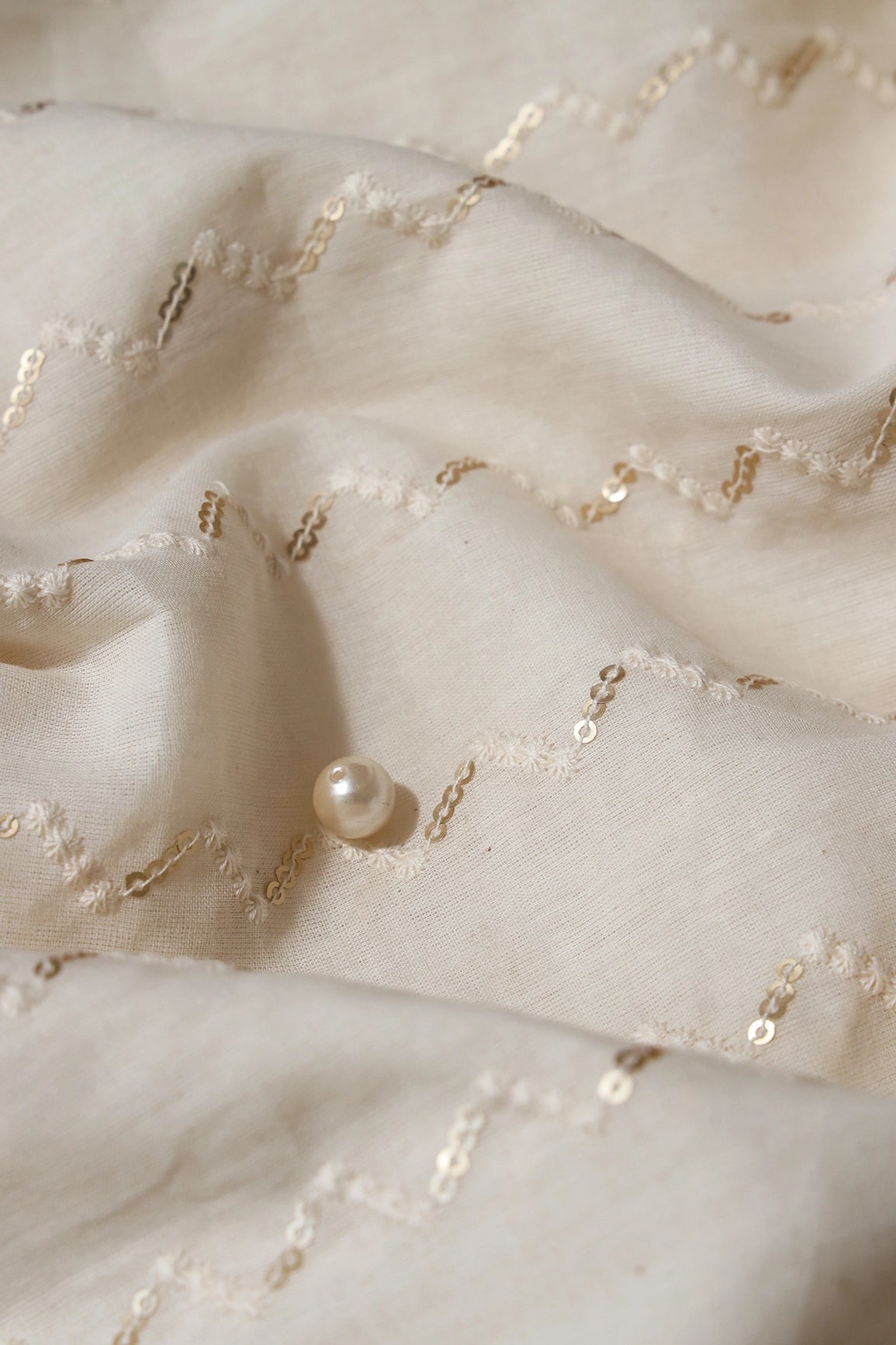 White Thread With Gold Sequins Small Chevron Embroidery Work On Off White Cotton Fabric - doeraa