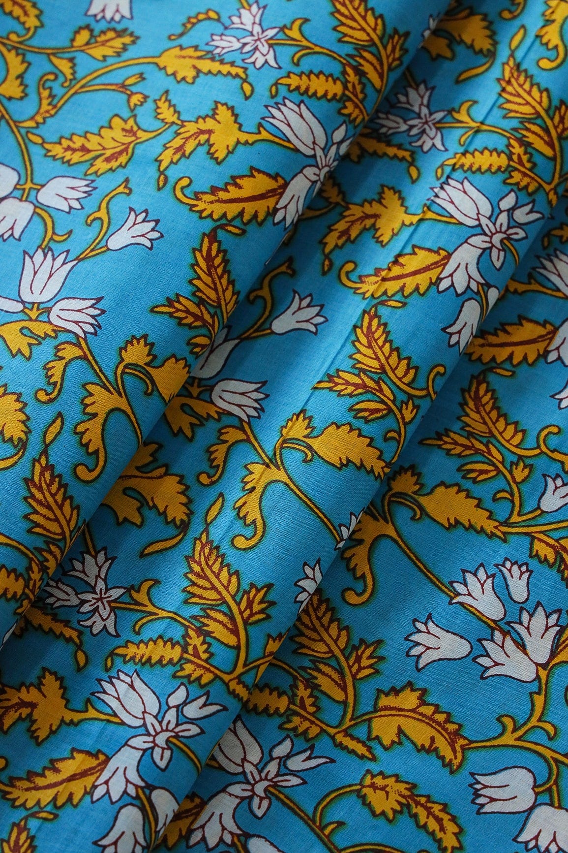 Yellow And White Floral Print On Blue Pure Cotton Fabric - doeraa