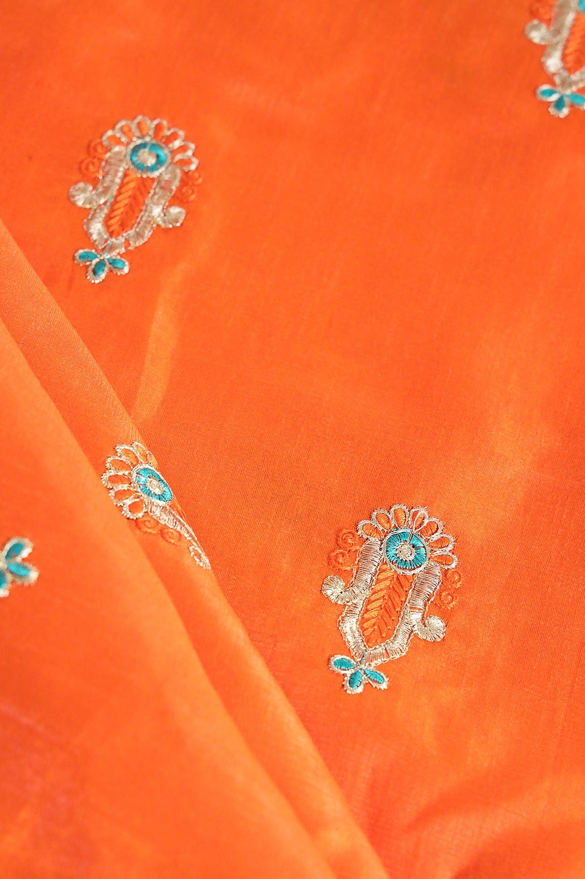 doeraa Banarasi Fabrics Orange Thread With Gold Zari Motif Embroidery On Orange Banglori Satin Fabric