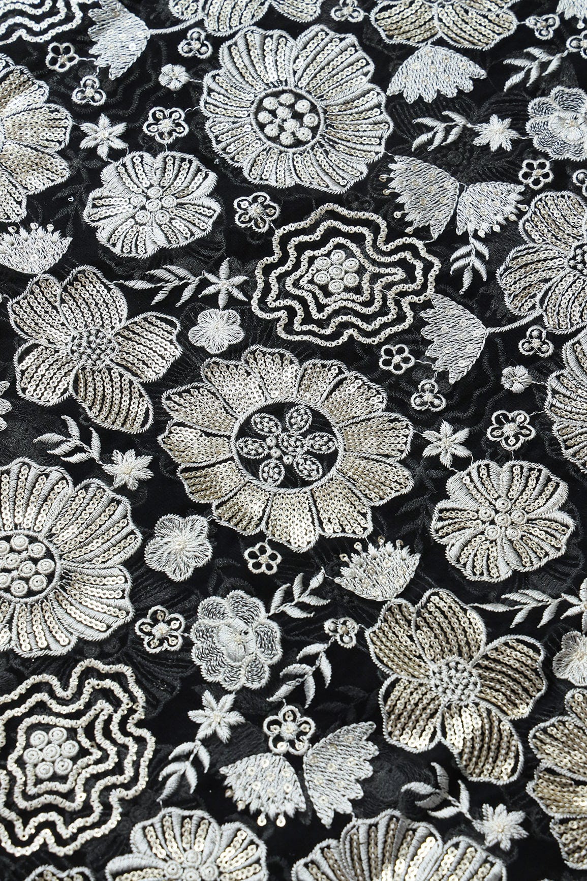 doeraa Embroidery Fabric White Thread With Gold Sequins Floral Embroidery Work On Black Viscose Georgette Fabric