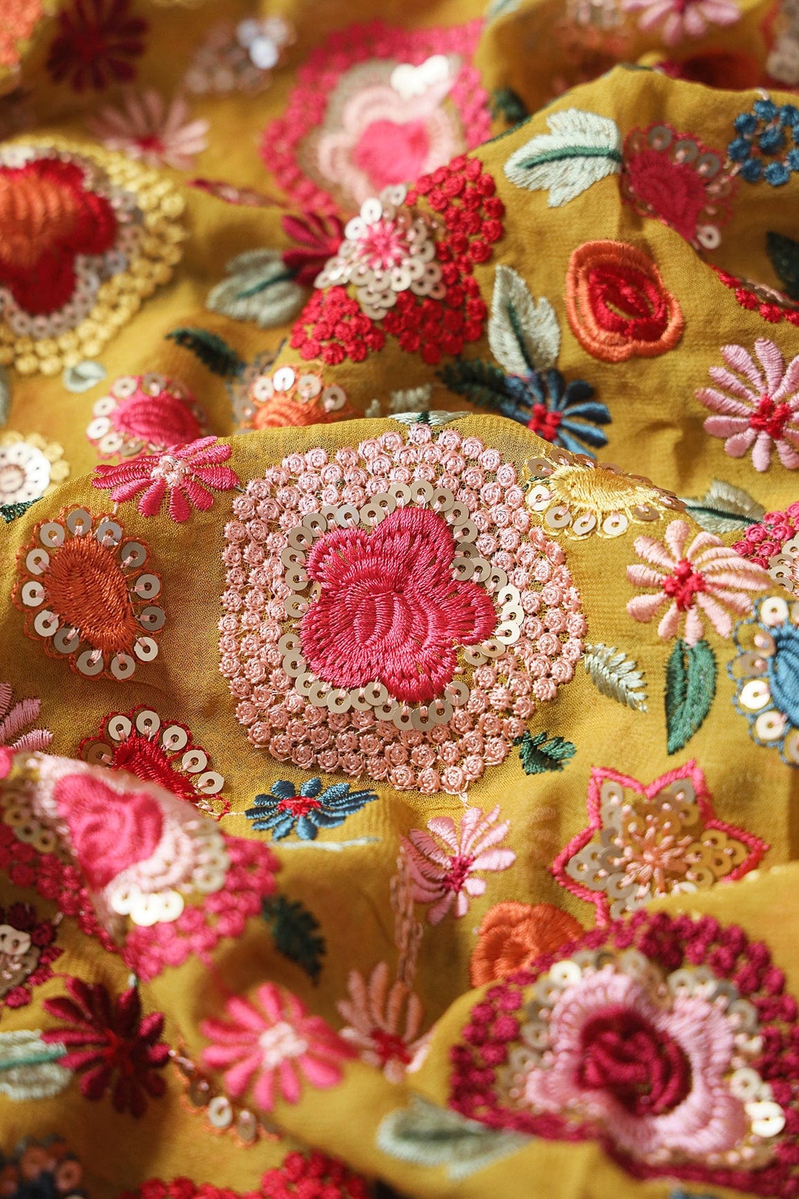 doeraa Embroidery Fabrics Elegant Floral Heavy Embroidery With Gold Sequins On Yellow Viscose Georgette Fabric