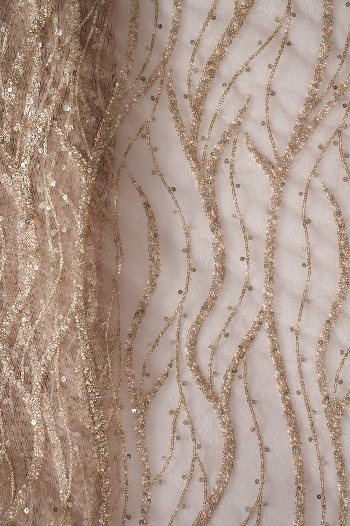 doeraa Embroidery Fabrics Gold And Silver Sequins With Peach Thread Embroidery on Peach Soft Net