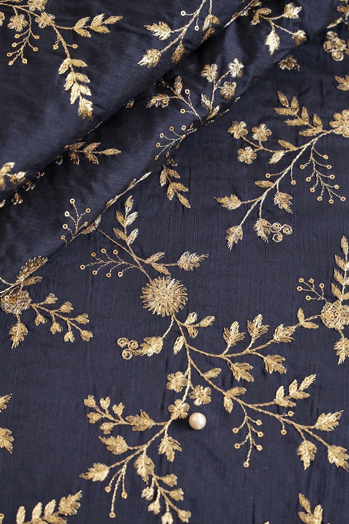doeraa Embroidery Fabrics Gold Sequins With Gold Zari Floral Embroidery Work On Navy Blue Raw Silk Fabric