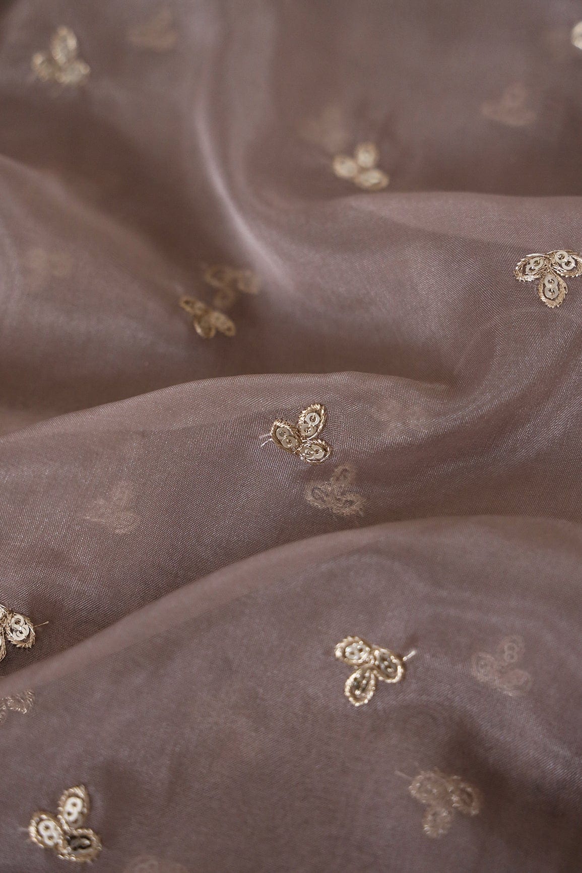 doeraa Embroidery Fabrics Gold Sequins With Gold Zari Small Leafy Motif Embroidery Work On Brown Organza Fabric