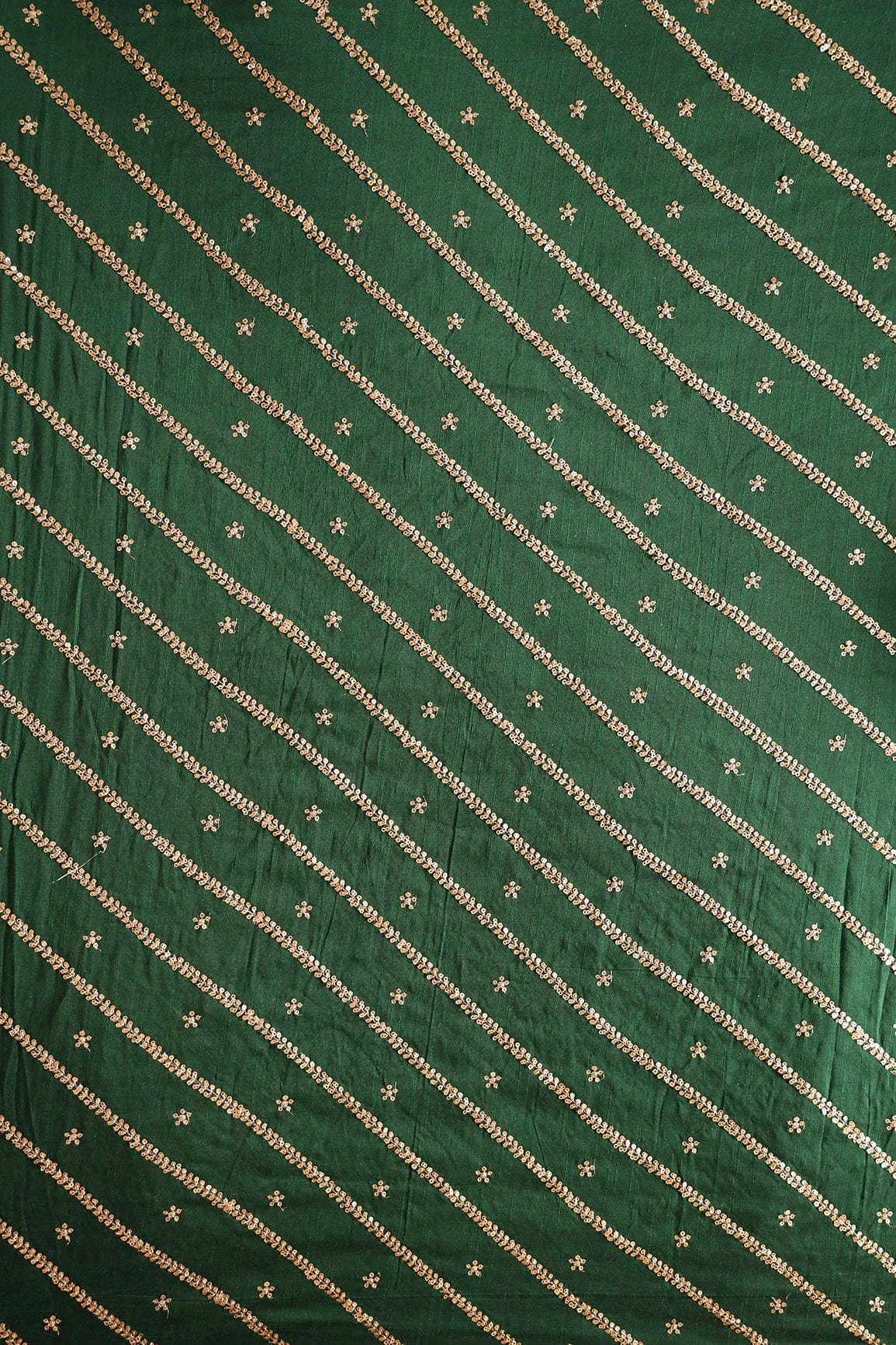 doeraa Embroidery Fabrics Gold Sequins With Gold Zari Stripes And Small Motif Embroidery Work On Bottle Green Raw Silk Fabric