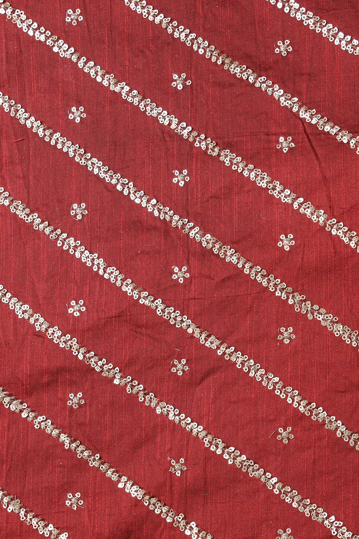 doeraa Embroidery Fabrics Gold Sequins With Gold Zari Stripes And Small Motif Embroidery Work On Maroon Raw Silk Fabric