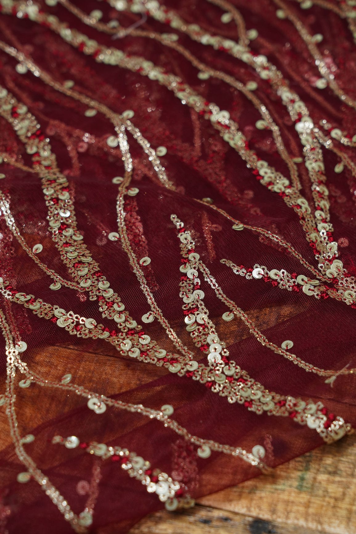 doeraa Embroidery Fabrics Gold Sequins With Maroon Thread Embroidery On Maroon Soft Net