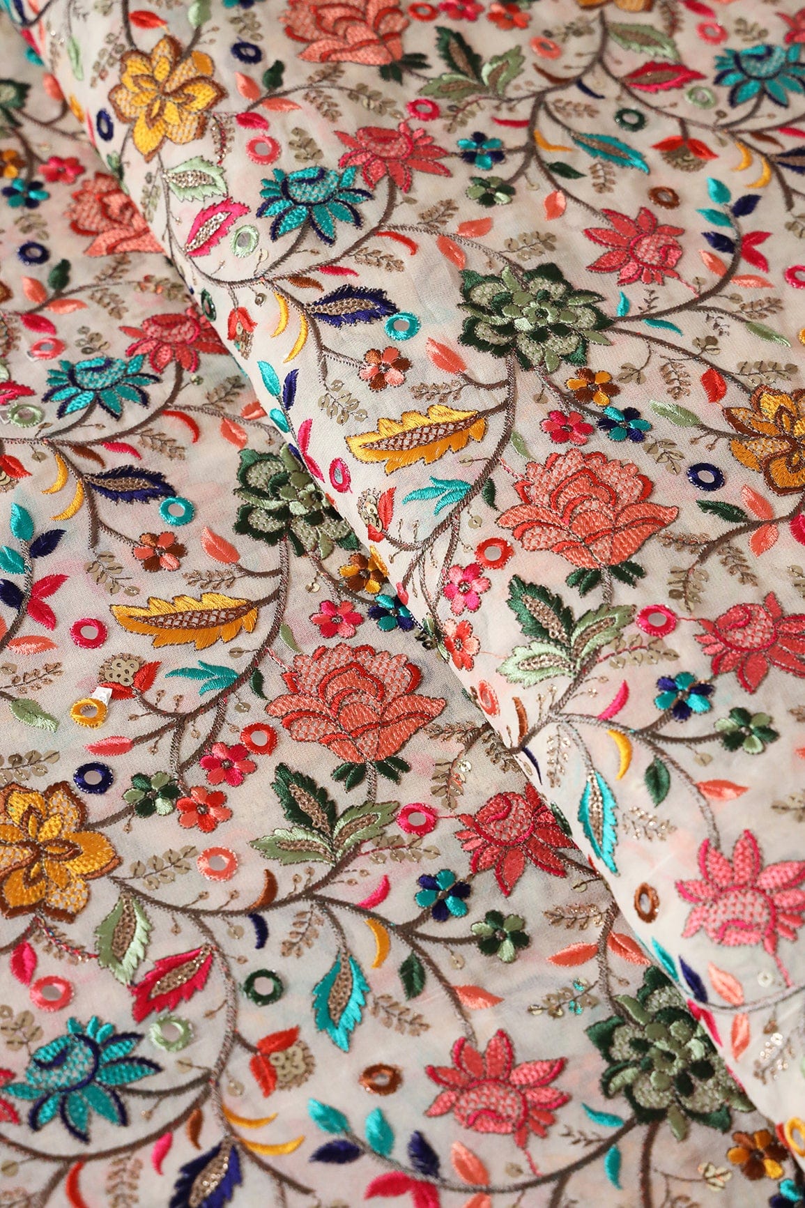 doeraa Embroidery Fabrics Multi Color Thread With Gold Sequins Exclusive Heavy Floral Embroidery On Cream Viscose Georgette Fabric