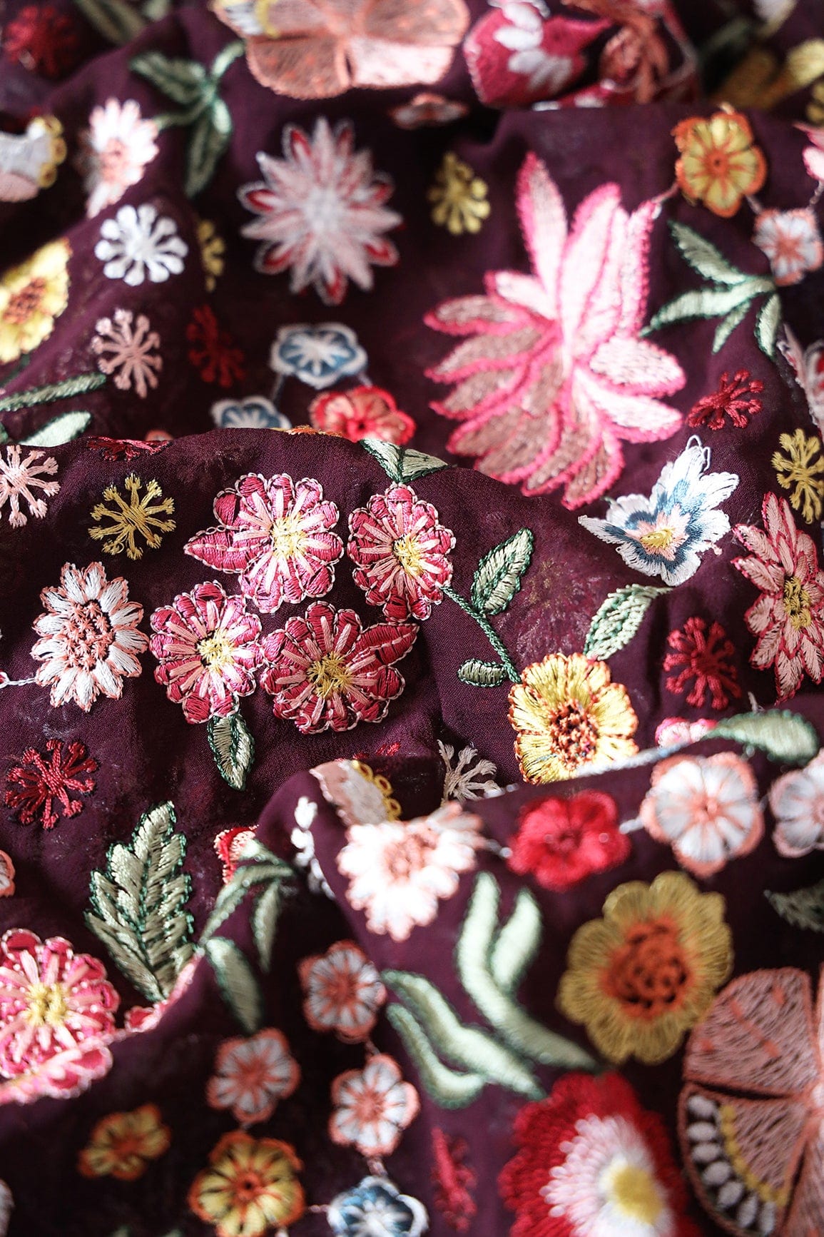 doeraa Embroidery Fabrics Ravishing Multi Color Floral Designer Embroidery On Wine Viscose Georgette Fabric
