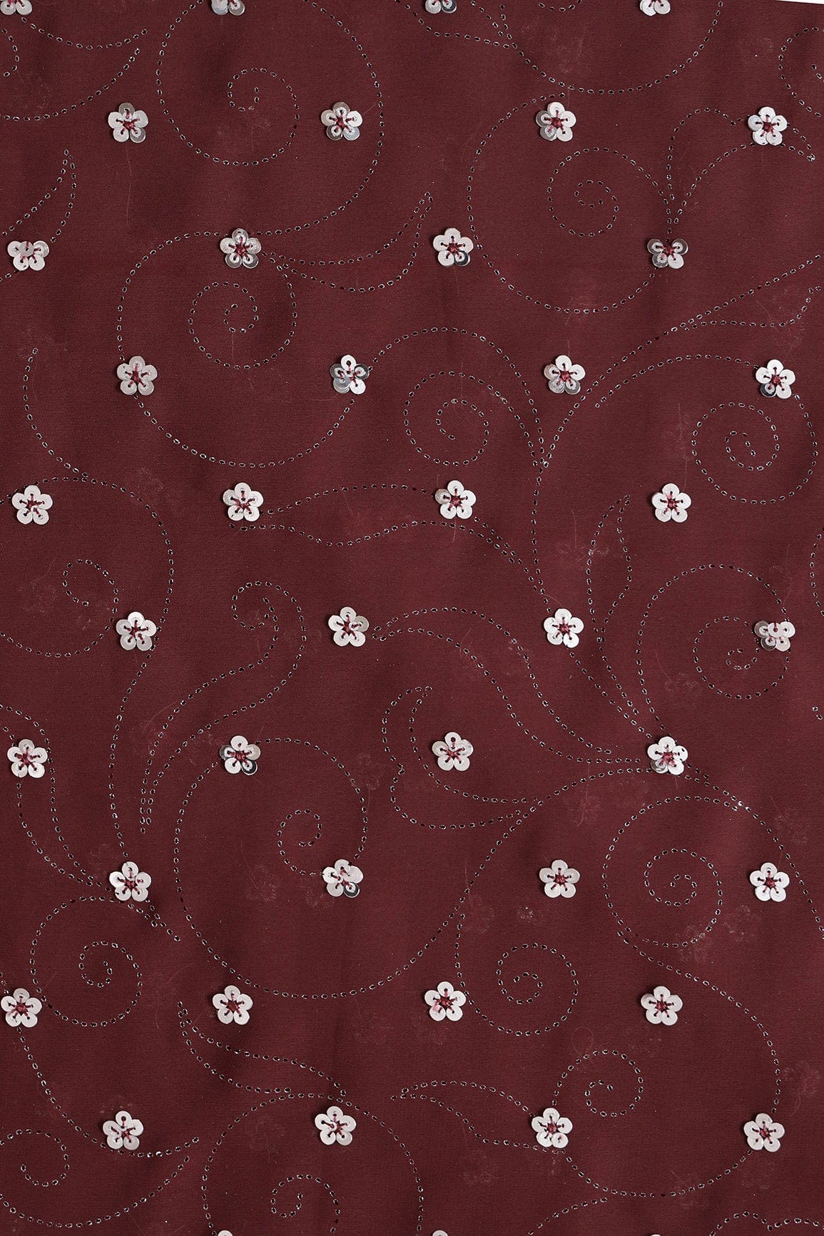 doeraa Embroidery Fabrics Silver Sequins Floral Embroidery With Laser Cut Foil Print On Maroon Georgette Fabric