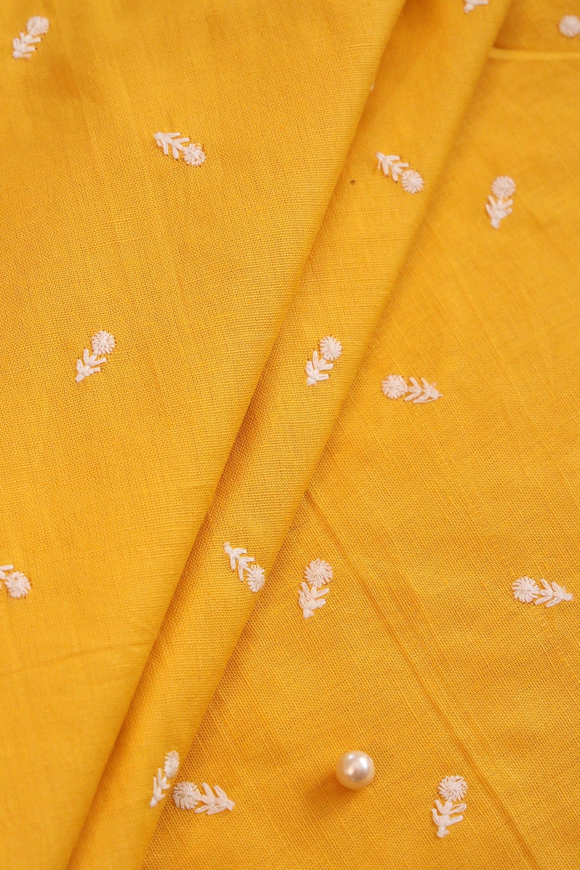 doeraa Embroidery Fabrics White Thread Small Floral Motif Embroidery Work On Yellow Cotton Linen Fabric