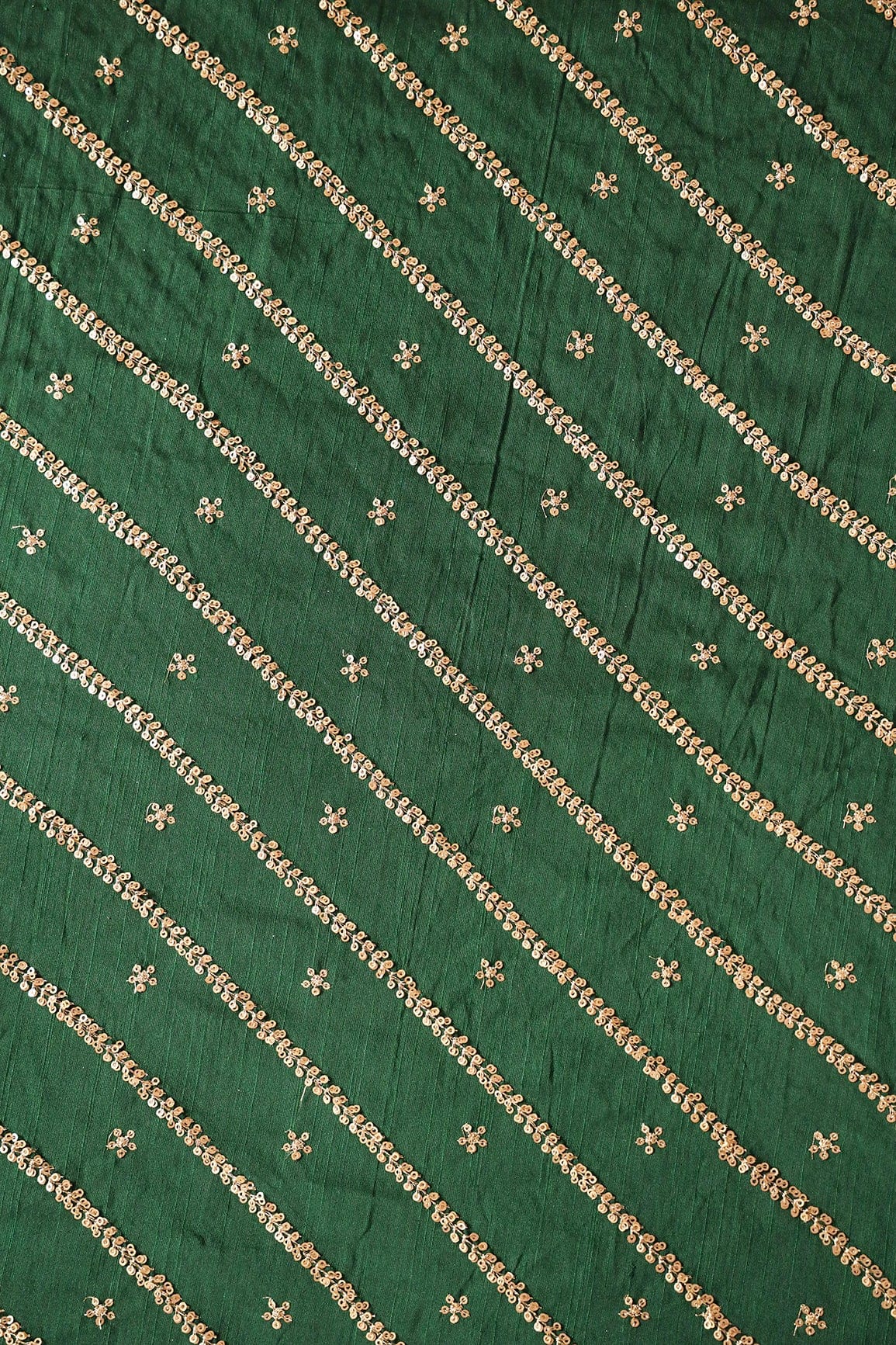 Gold Sequins With Gold Zari Stripes And Small Motif Embroidery Work On Bottle Green Raw Silk Fabric - doeraa