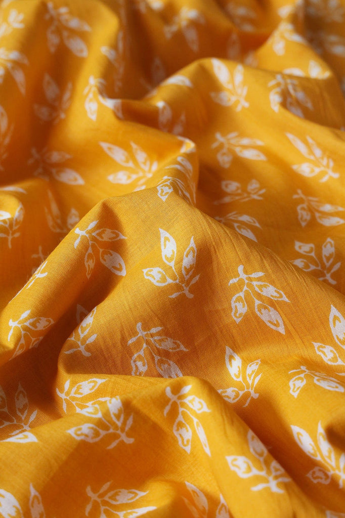 doeraa Prints Mango Yellow And White Leafy Print On Pure Cotton Fabric