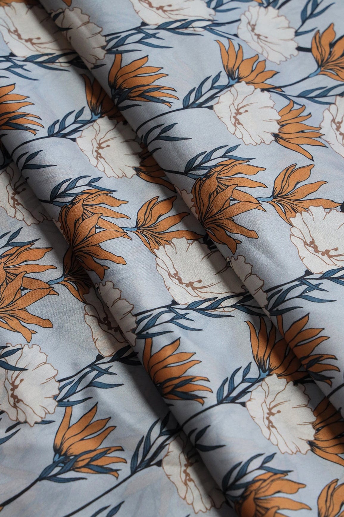 doeraa Prints Orange And White Floral Pattern Digital Print On Light Grey Georgette Satin Fabric