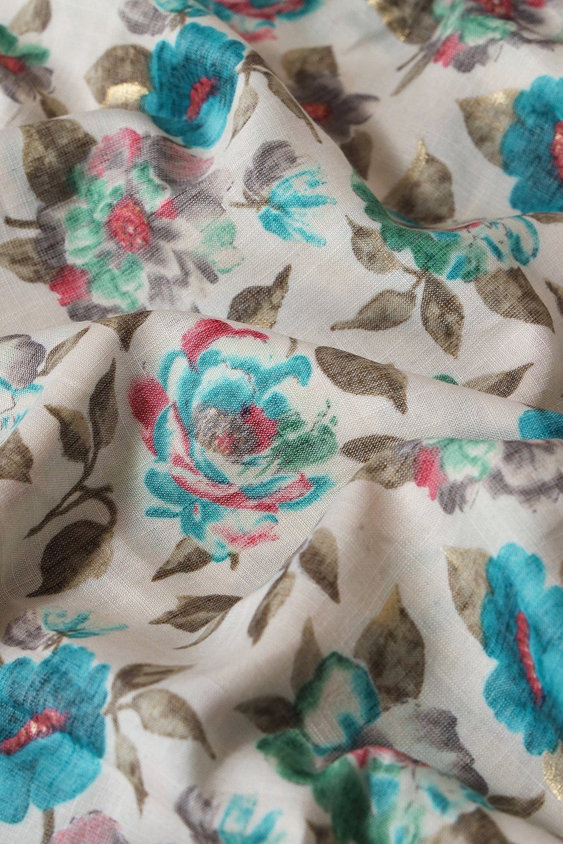 doeraa Prints Turquoise And Green Floral Pattern With Foil Print On Off White Rayon Fabric