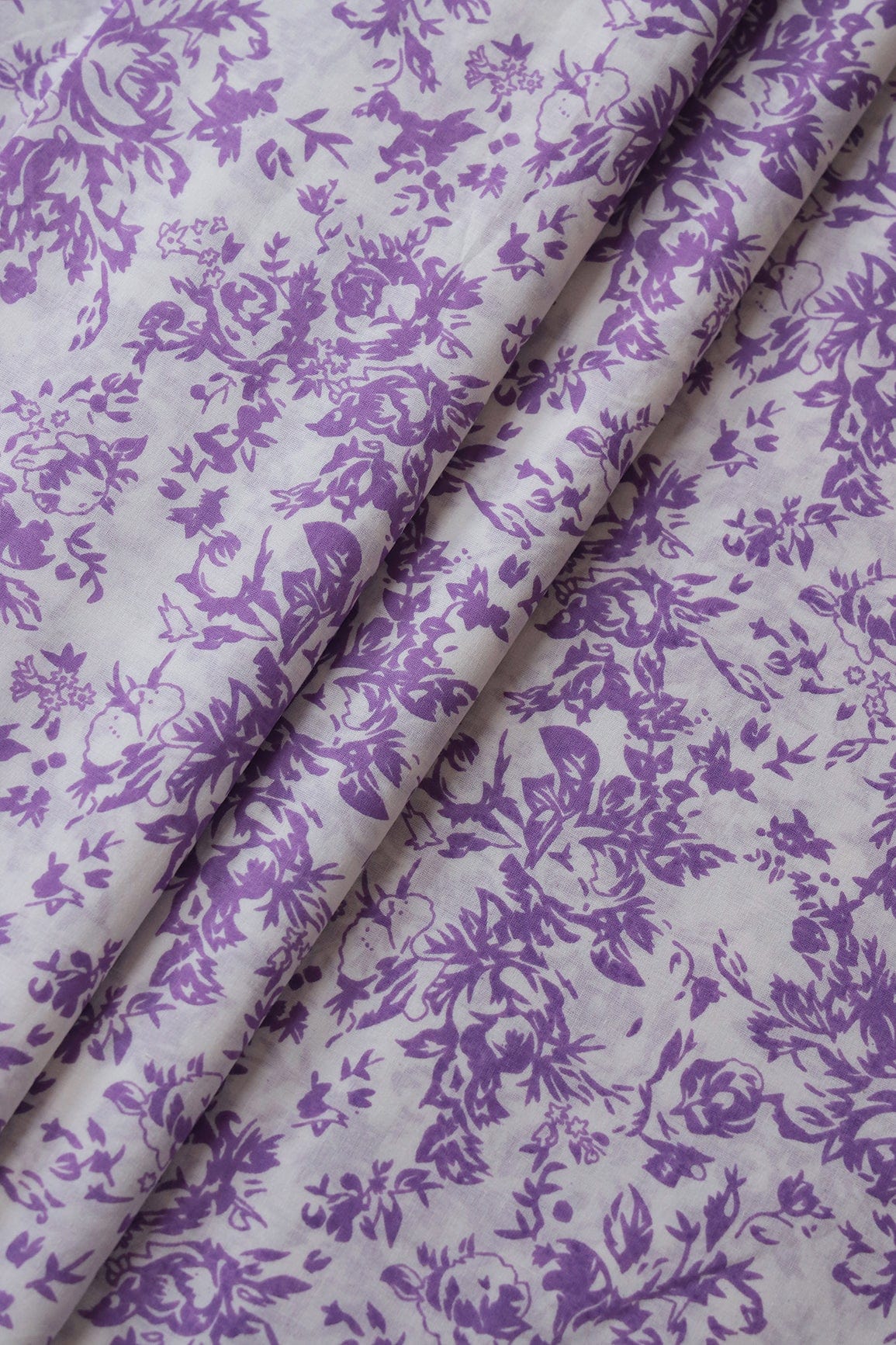 doeraa Prints White And Lavender Floral Print On Pure Mul Cotton Fabric