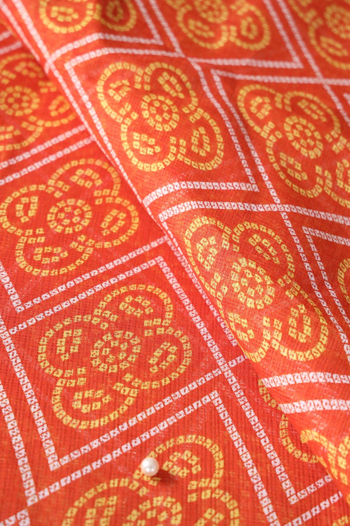 doeraa Prints White And Yellow Bandhani Print On Orange Kota Doria Fabric