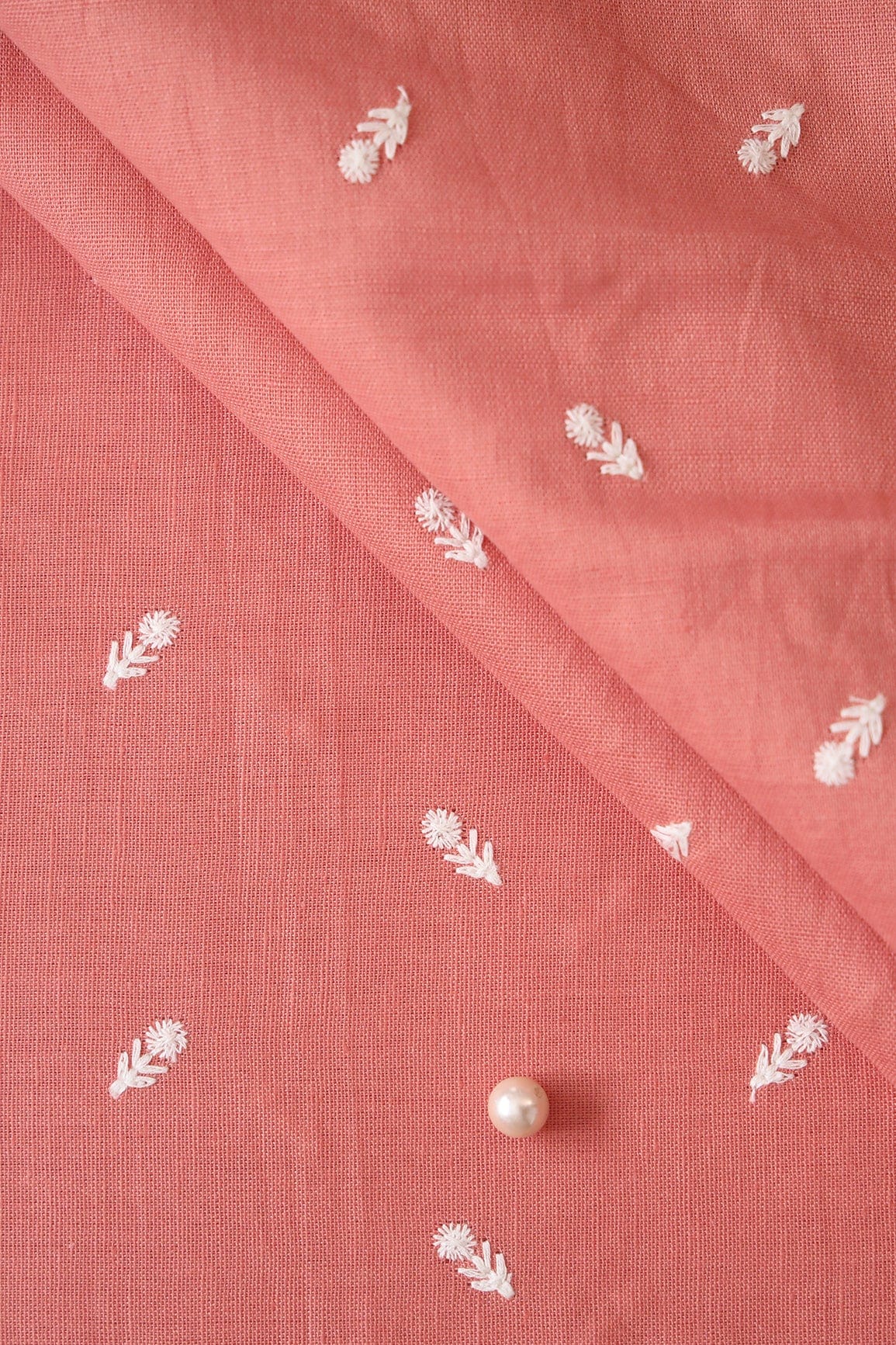 White Thread Small Floral Motif Embroidery Work On Peach Cotton Linen Fabric - doeraa