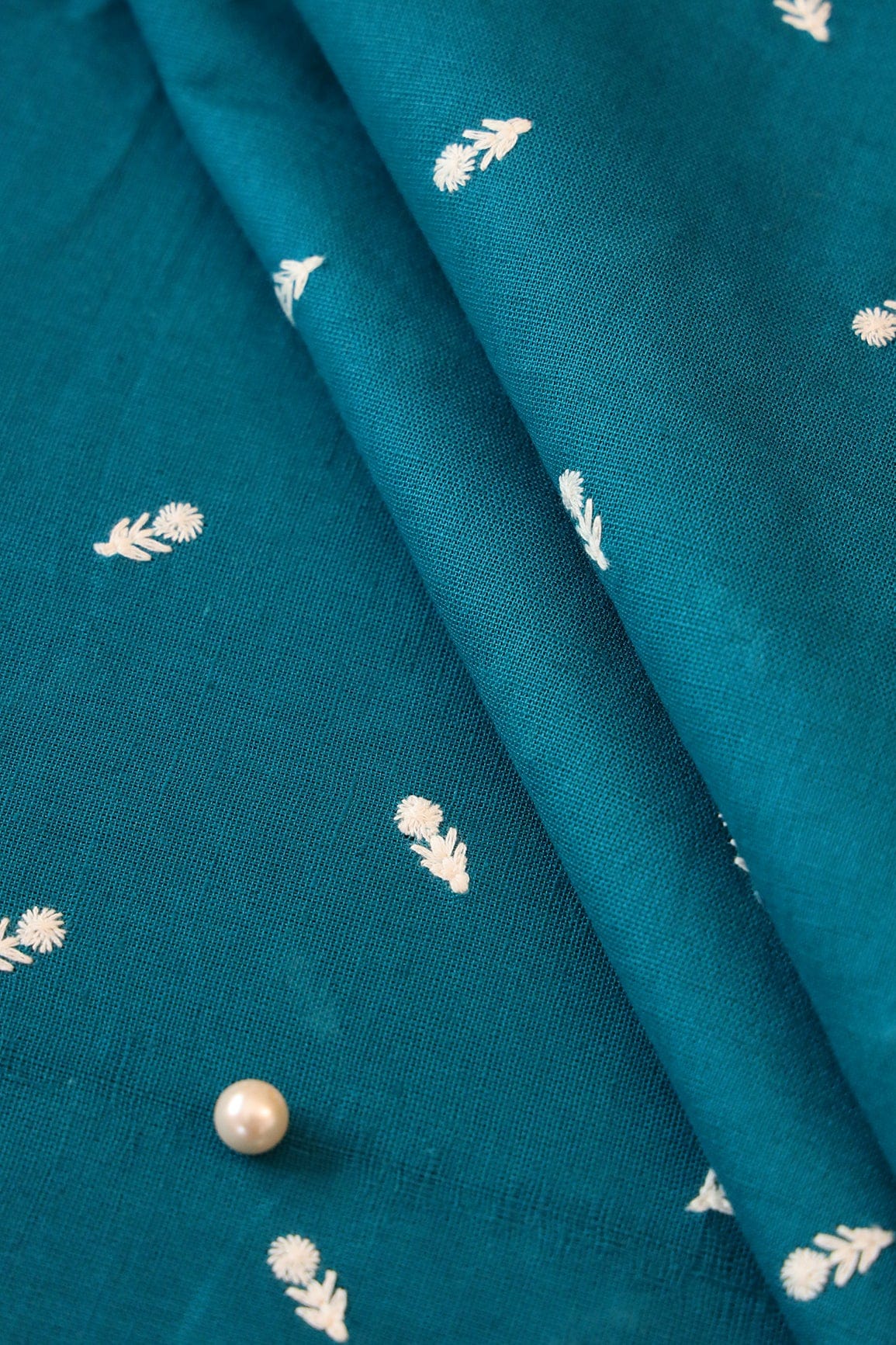 White Thread Small Floral Motif Embroidery Work On Turquoise Cotton Linen Fabric - doeraa